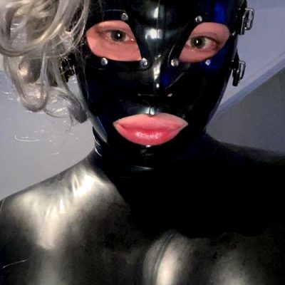 A Rubber Girl Living In Her Rubber World